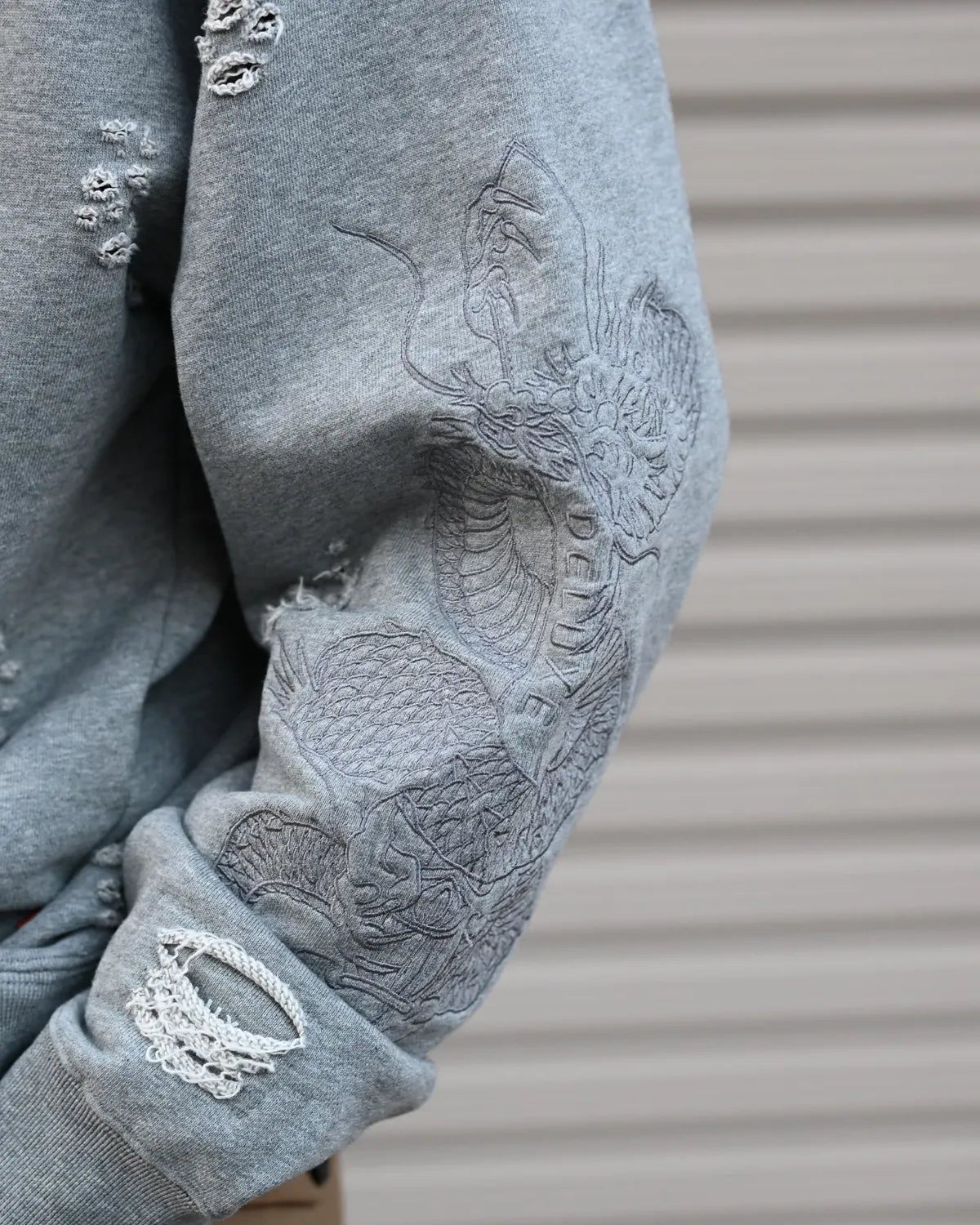 DELUXE / DELUXE × TIGHTBOOTH DAMAGE CREW SWEAT (26SD2718)