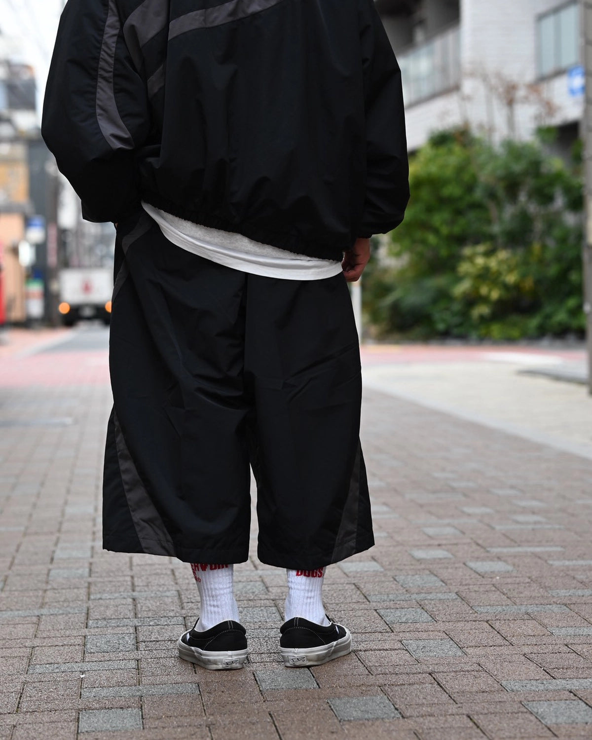 COOTIE PRODUCTIONS® / Nylon Paneling Shin Cut Wide Track Pants (CTE-26S122)