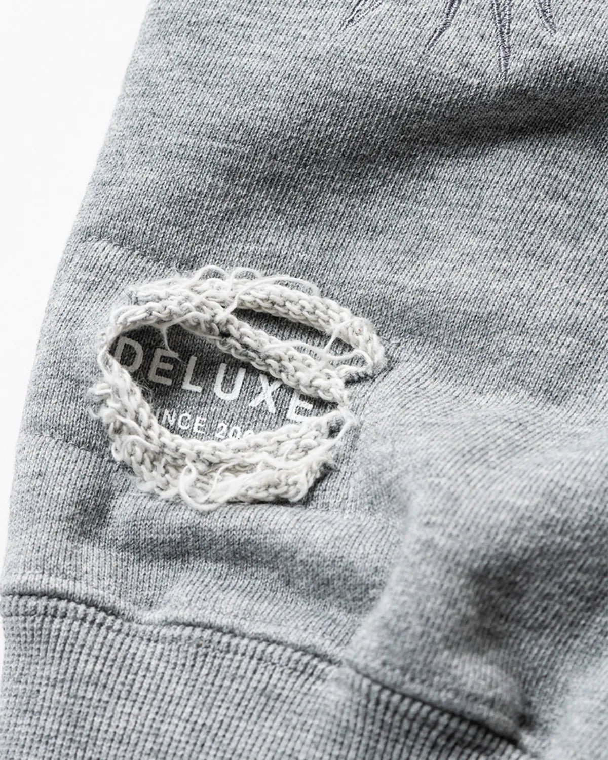 DELUXE / DELUXE × TIGHTBOOTH DAMAGE CREW SWEAT (26SD2718)