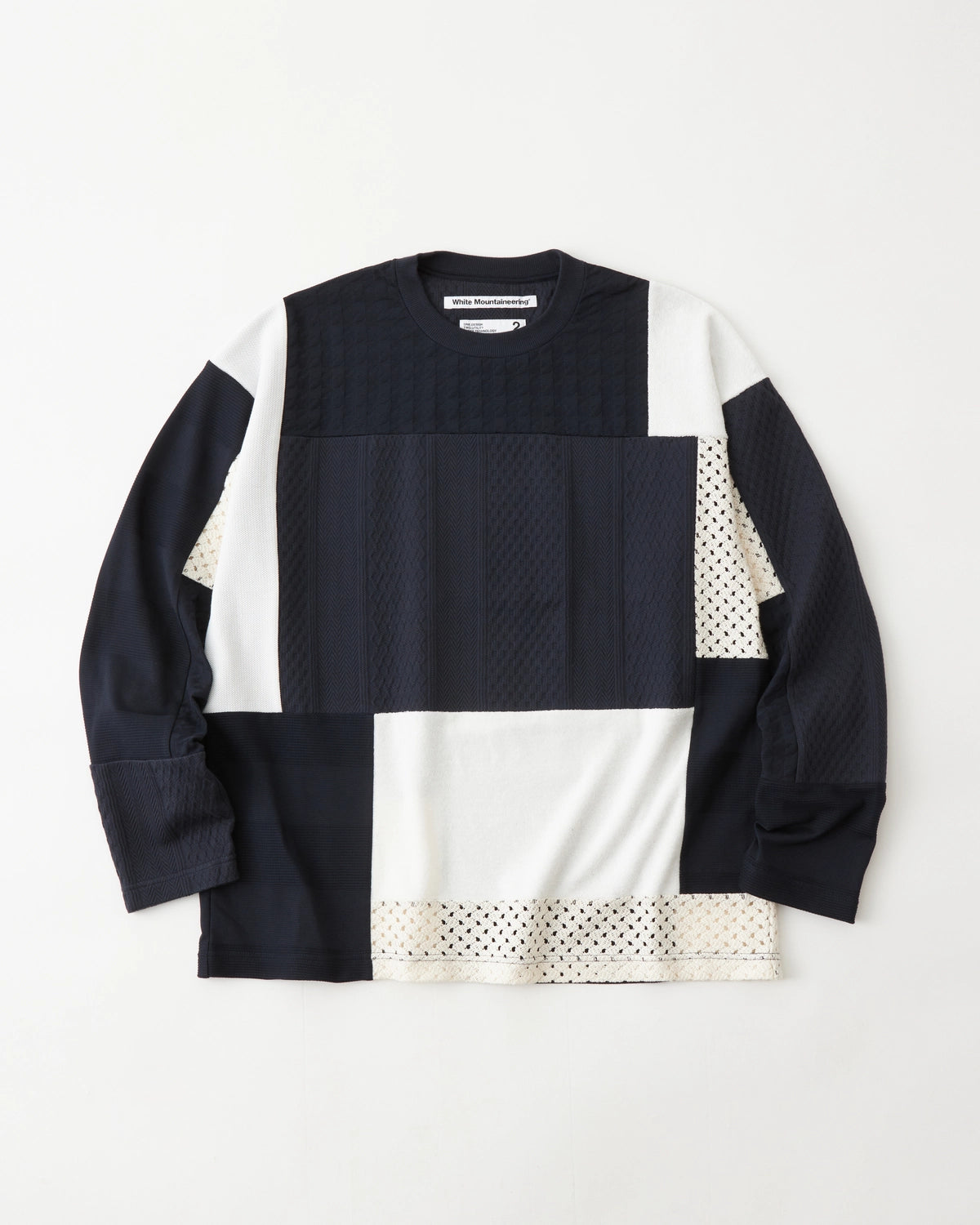 White Mountaineering の PATCHWORK LONG SLEEVE T-SHIRT (WM2571531)