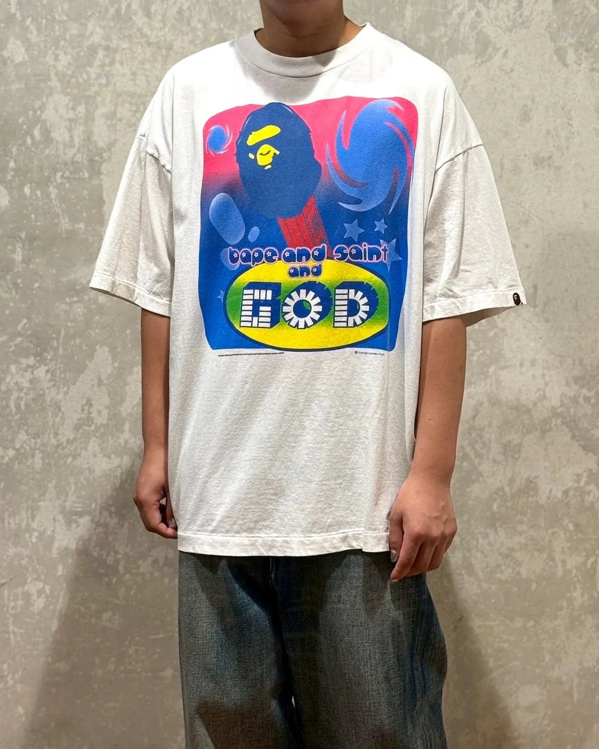 ©︎SAINT Mxxxxxx × A BATHING APE® /  BEPA_SS TEE_GOD (SM-HR1-0000-C35)