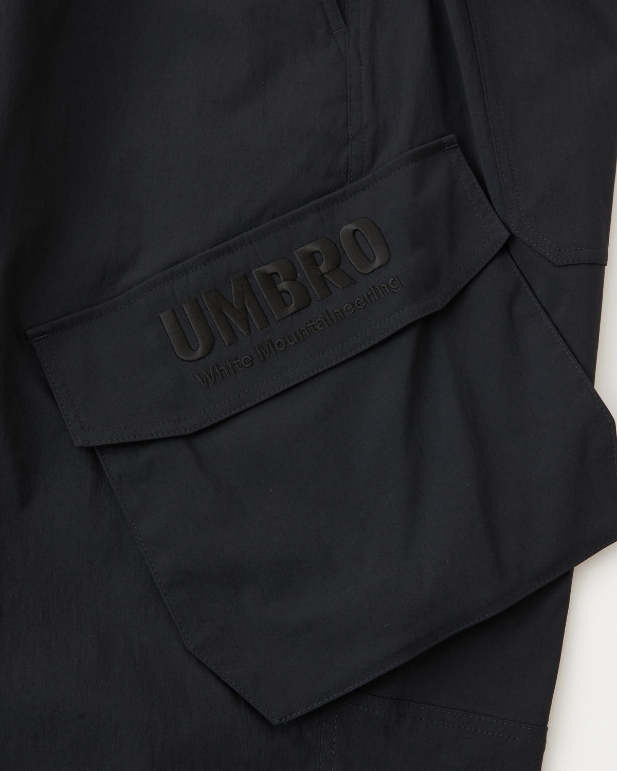 White Mountaineering  / WM×UMBRO EASY CARGO PANTS (WM2571418)