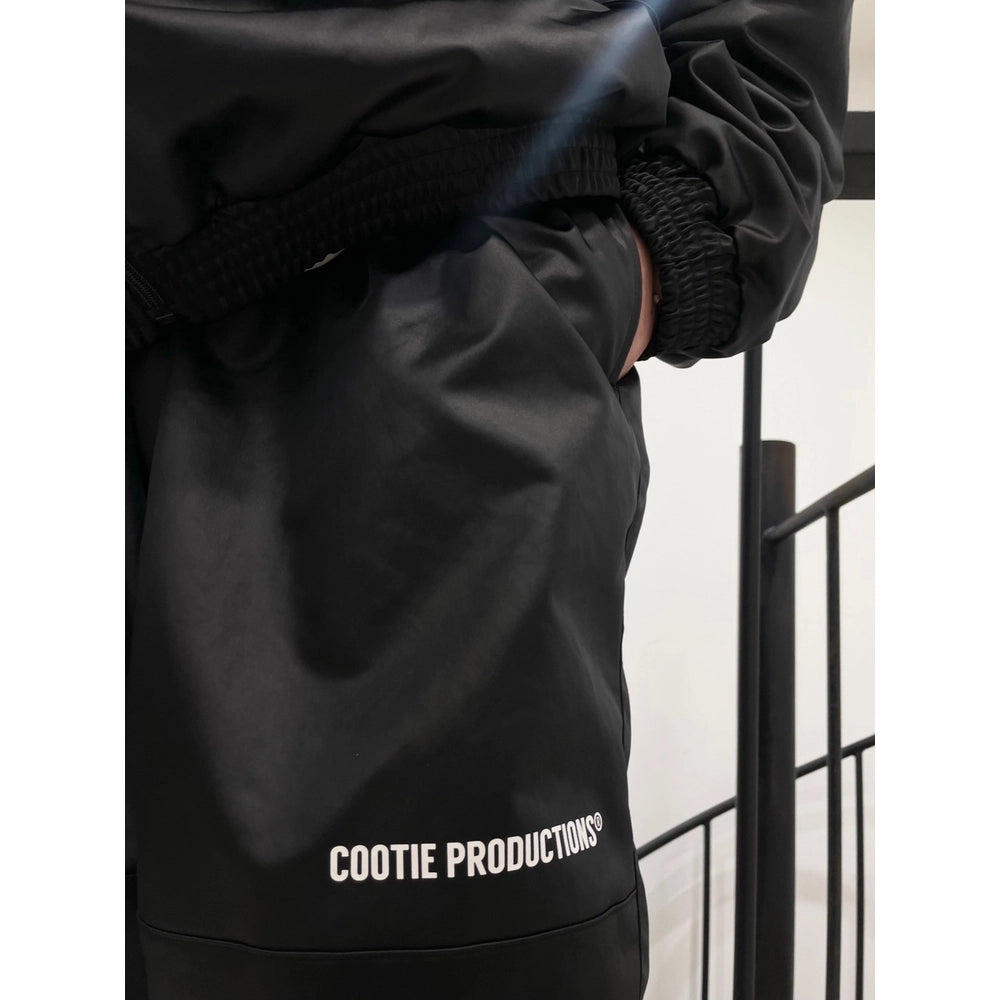 COOTIE PRODUCTIONS® / Damp Coated Satin Wide Track Pants (CTE-24A124)