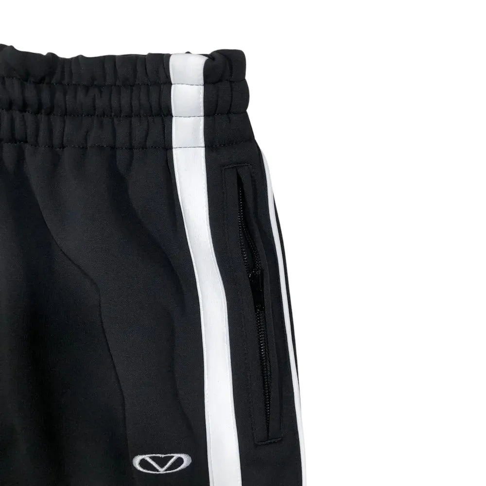 VETEMENTS / OVER LOGO GYM PANTS (UA66PA310B25039)