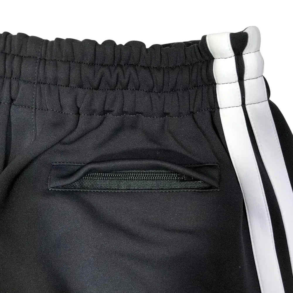 VETEMENTS / OVER LOGO GYM PANTS (UA66PA310B25039)