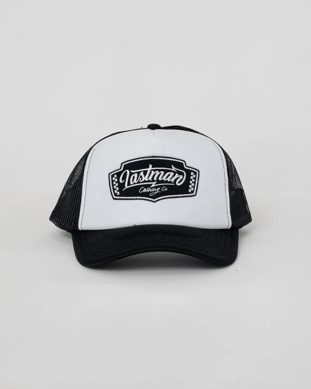 LASTMAN の EMBROID TRUCKR CAP -LM CLOTHING- (261LM-AC03)