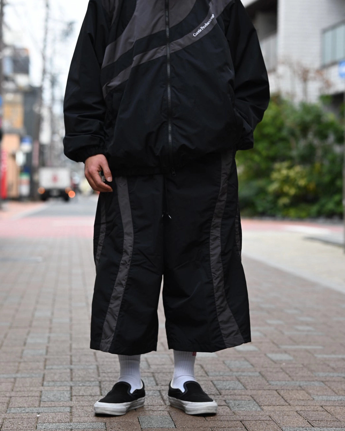 COOTIE PRODUCTIONS® / Nylon Paneling Shin Cut Wide Track Pants (CTE-26S122)