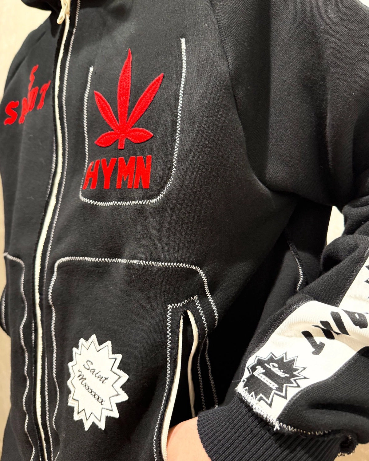©︎SAINT Mxxxxxx × A LOVE MOVEMENT / ALM_ZIP HOODIE (SM-HR1-0000-C68)