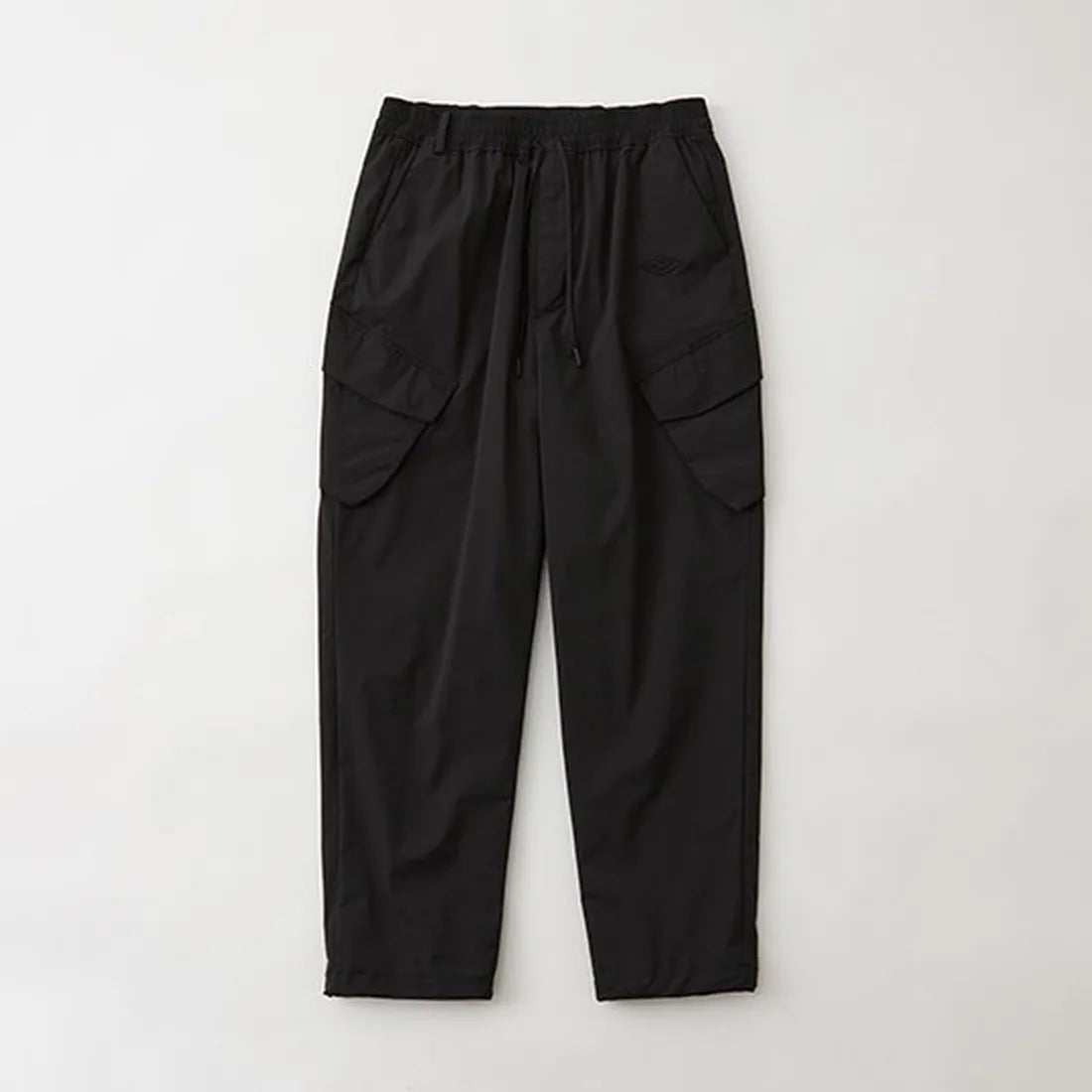 White Mountaineering  の WM×UMBRO EASY CARGO PANTS (BK2473402)