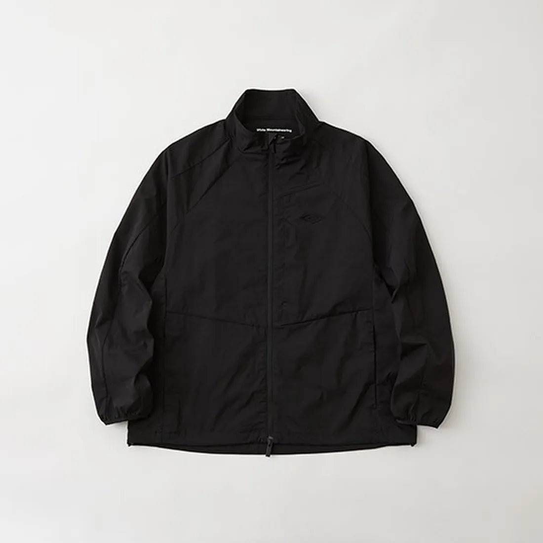 White Mountaineering  の WM × UMBRO BLOUSON (BK2473207)