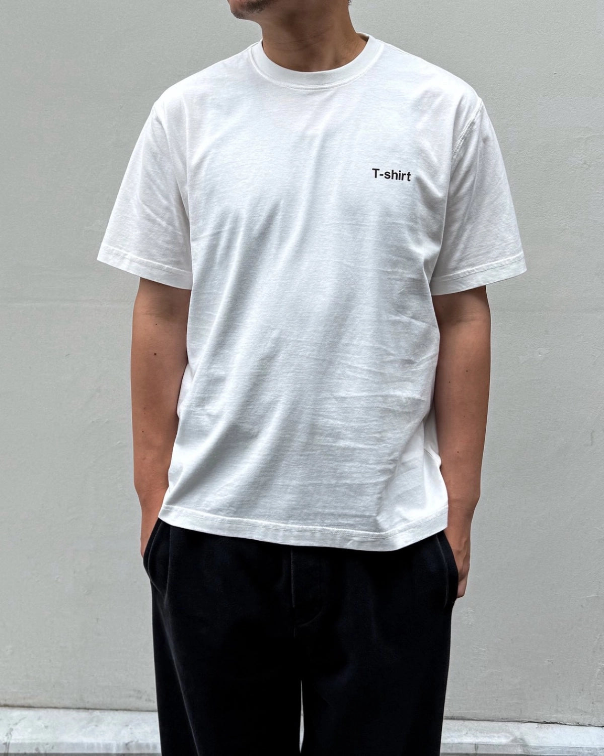 VETEMENTS の DEFINITION REGULAR T-SHIRT (MH27TR220W)
